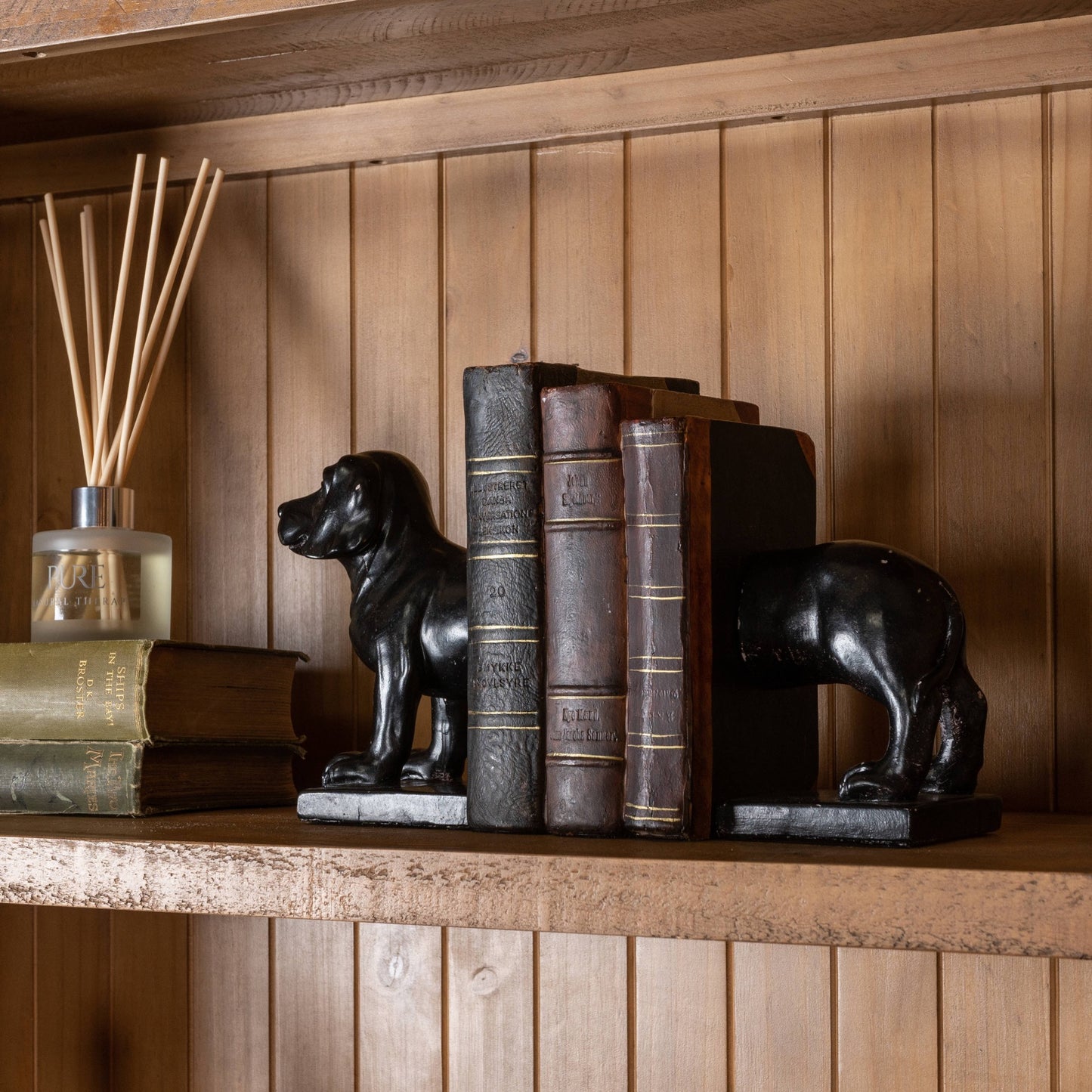 Black bookends in shape of dog