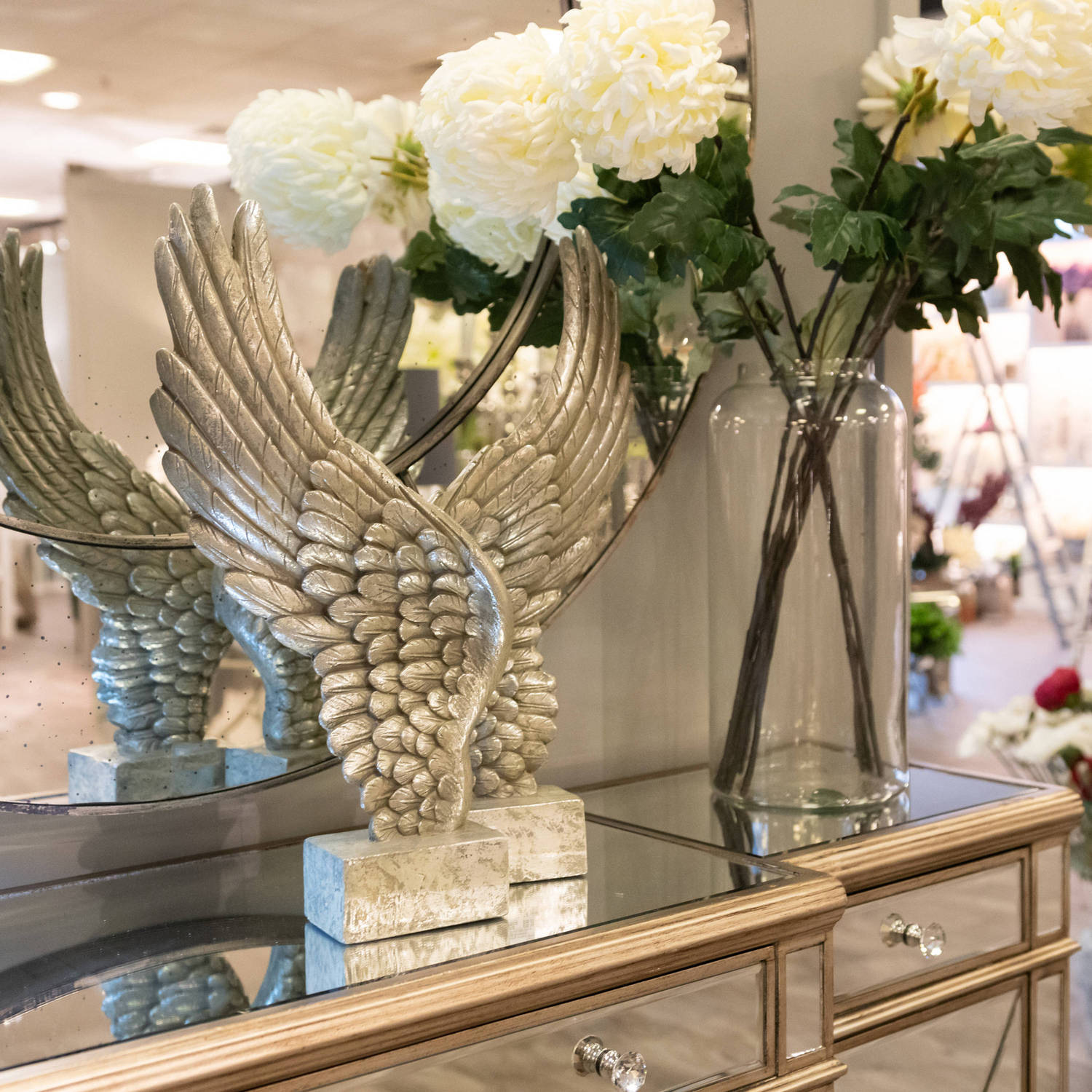 Wing ornament with flowers 