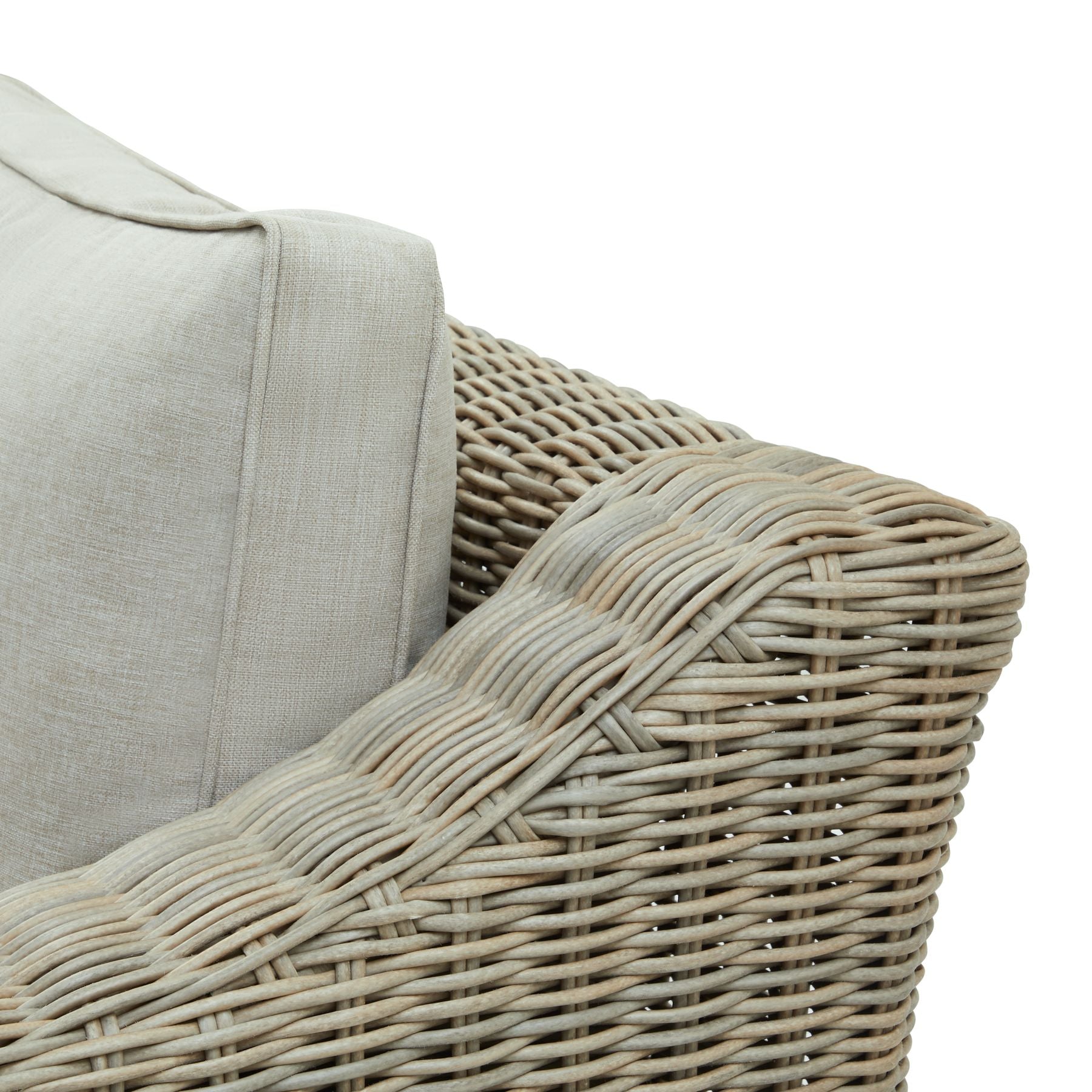 Wicker style outdoor sofa with cream cushions