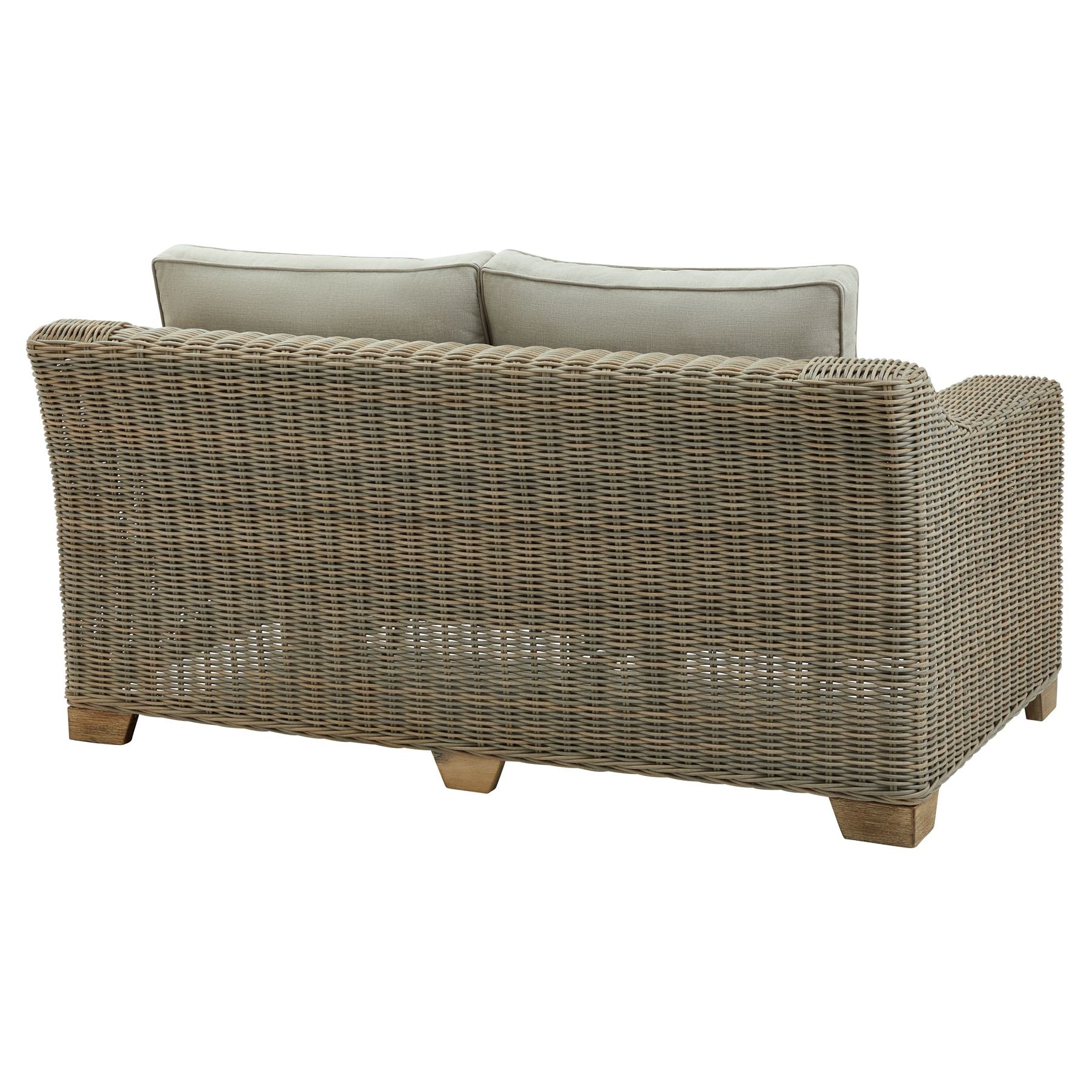 Wicker style outdoor sofa with cream cushions