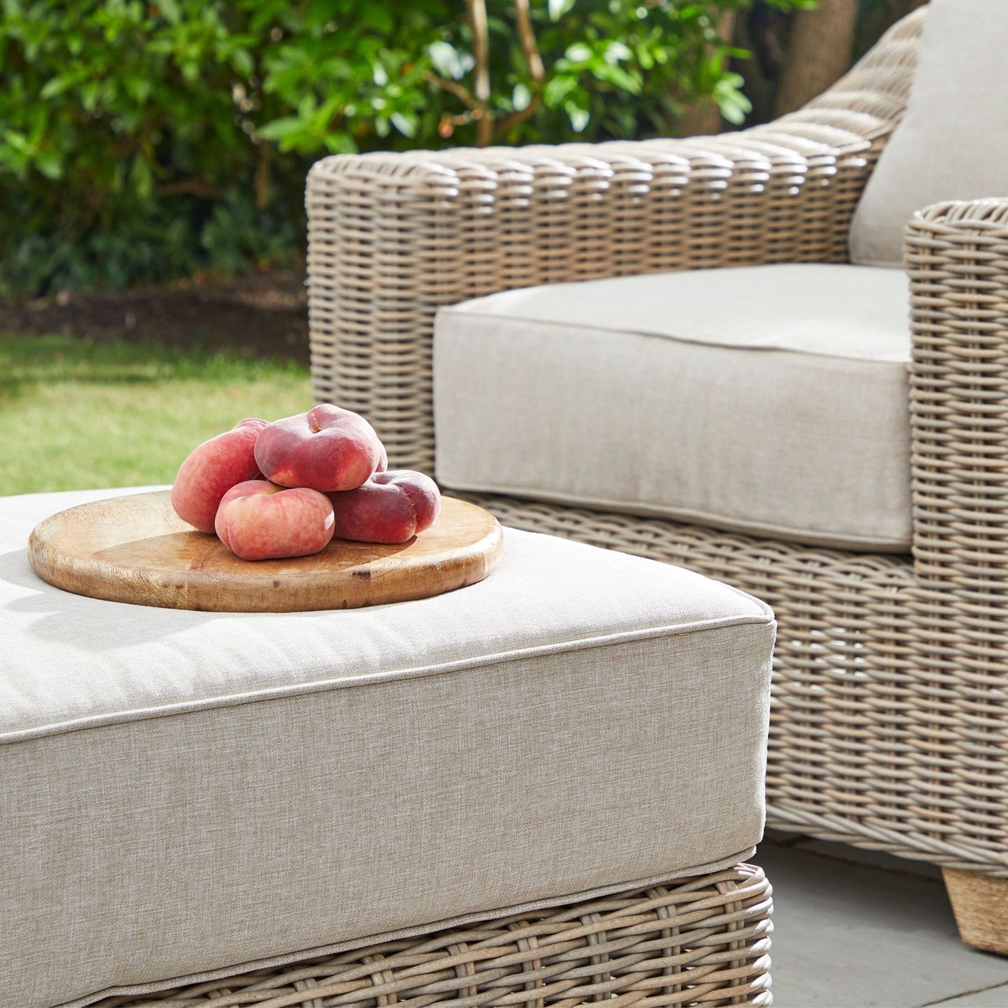 Outdoor wicker foot stall with cushion