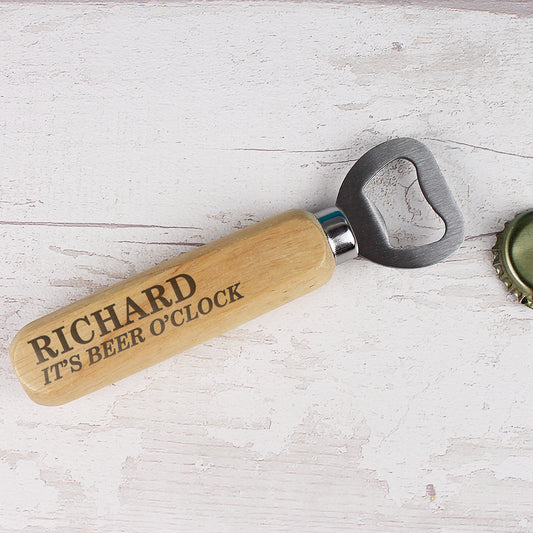 A bottle opener with a wooden handle that can be personalised with a name and phrase or date