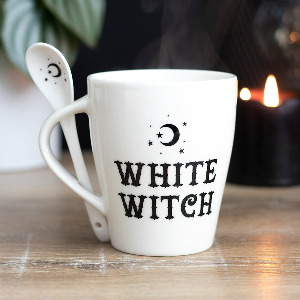 A white mug and spoon set with the wording white witch in black