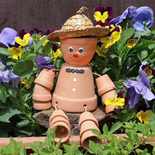 Terracotta plant pot man with straw hat