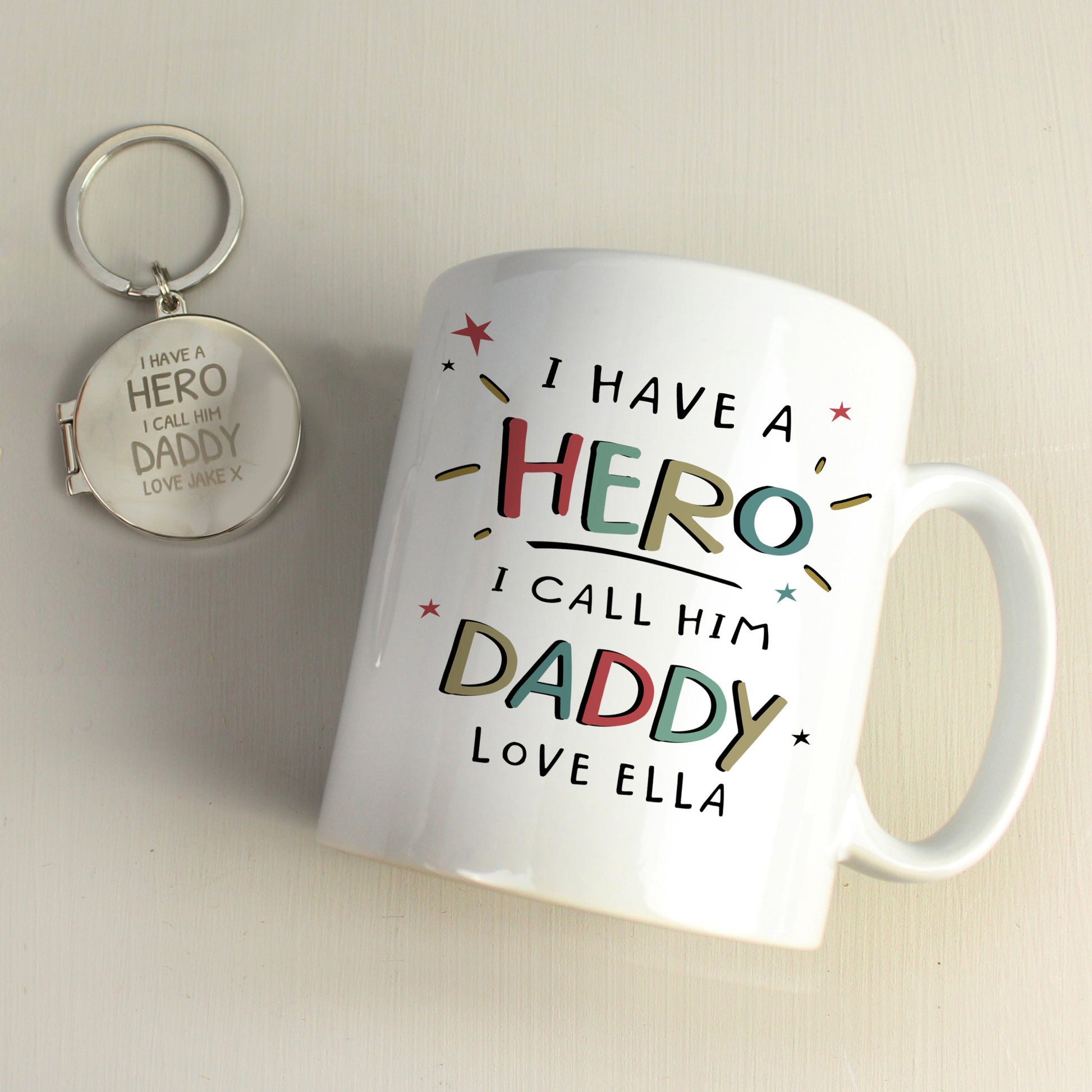 Silver keyring with words ‘ I have a hero, I call him daddy’ and matching mug