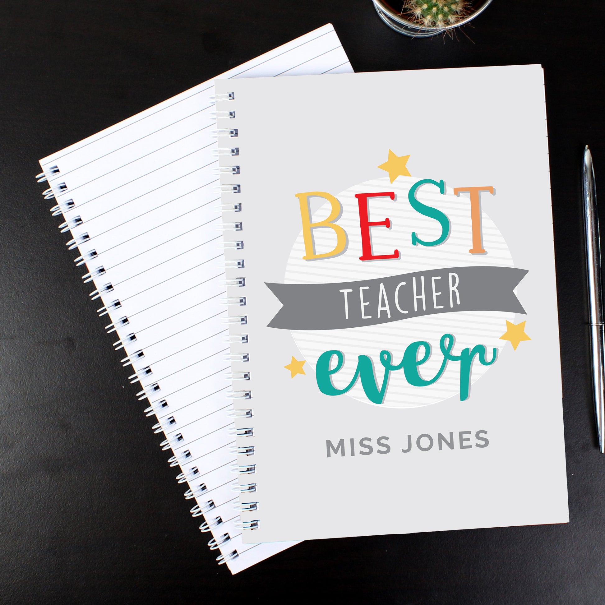 Personalised notebook with words ‘Best Teacher Ever’ and a name