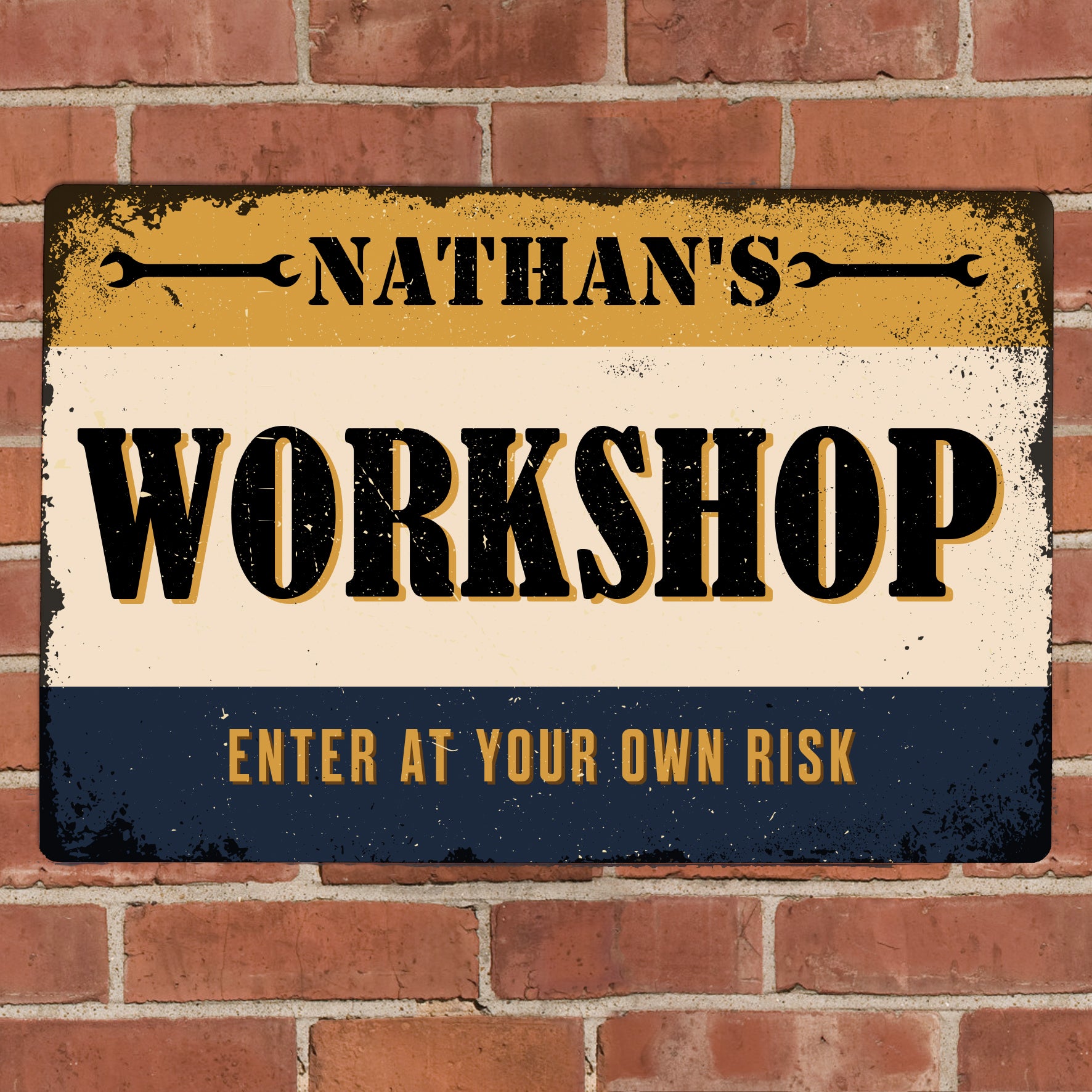 Metal sign with words ‘Nathan’s workshop, enter at your own risk’