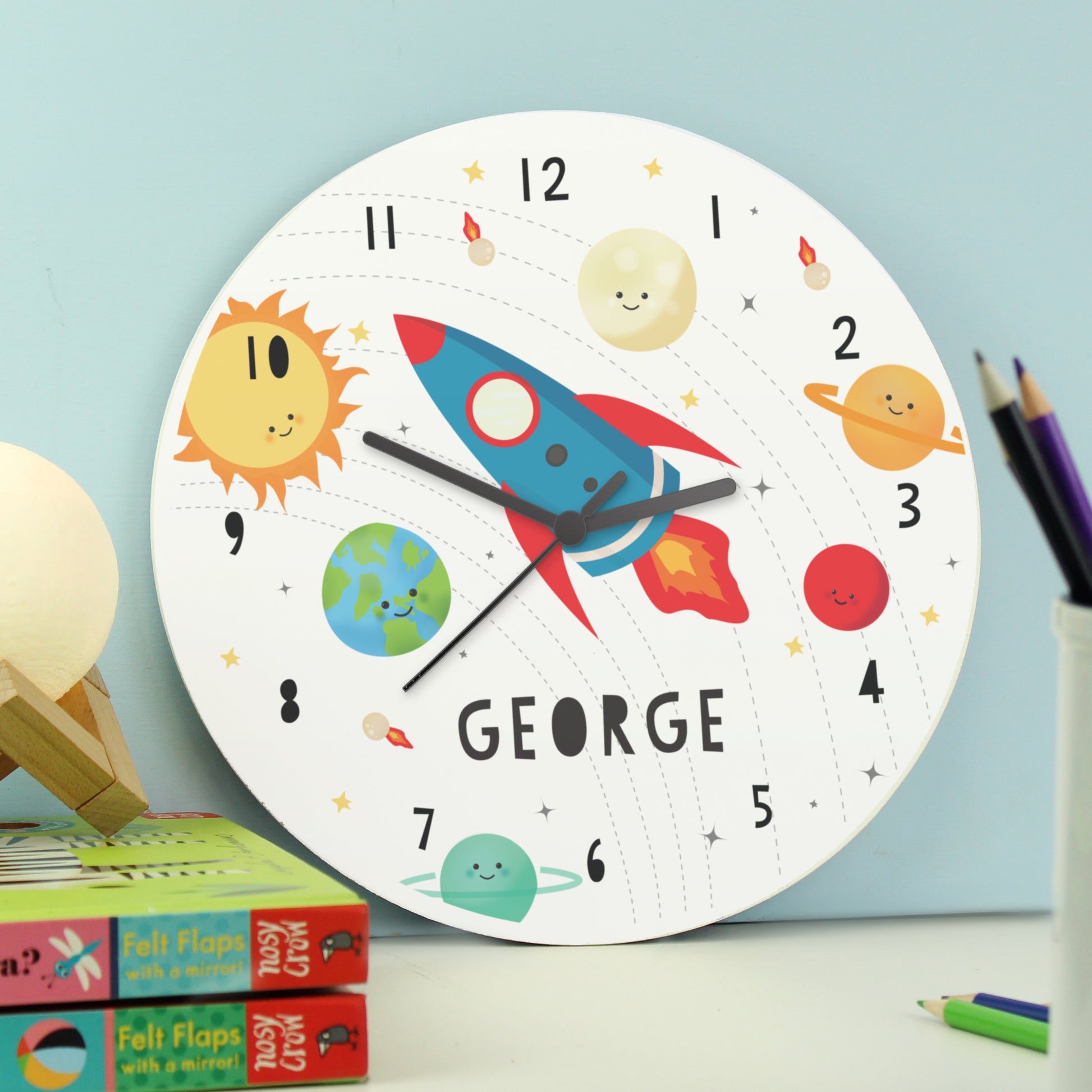 Space rocket planet clock