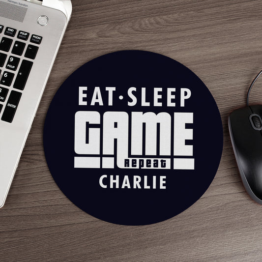 Mouse mat with words ‘Eat, Sleep, Game, Repeat’ and personalised with a name