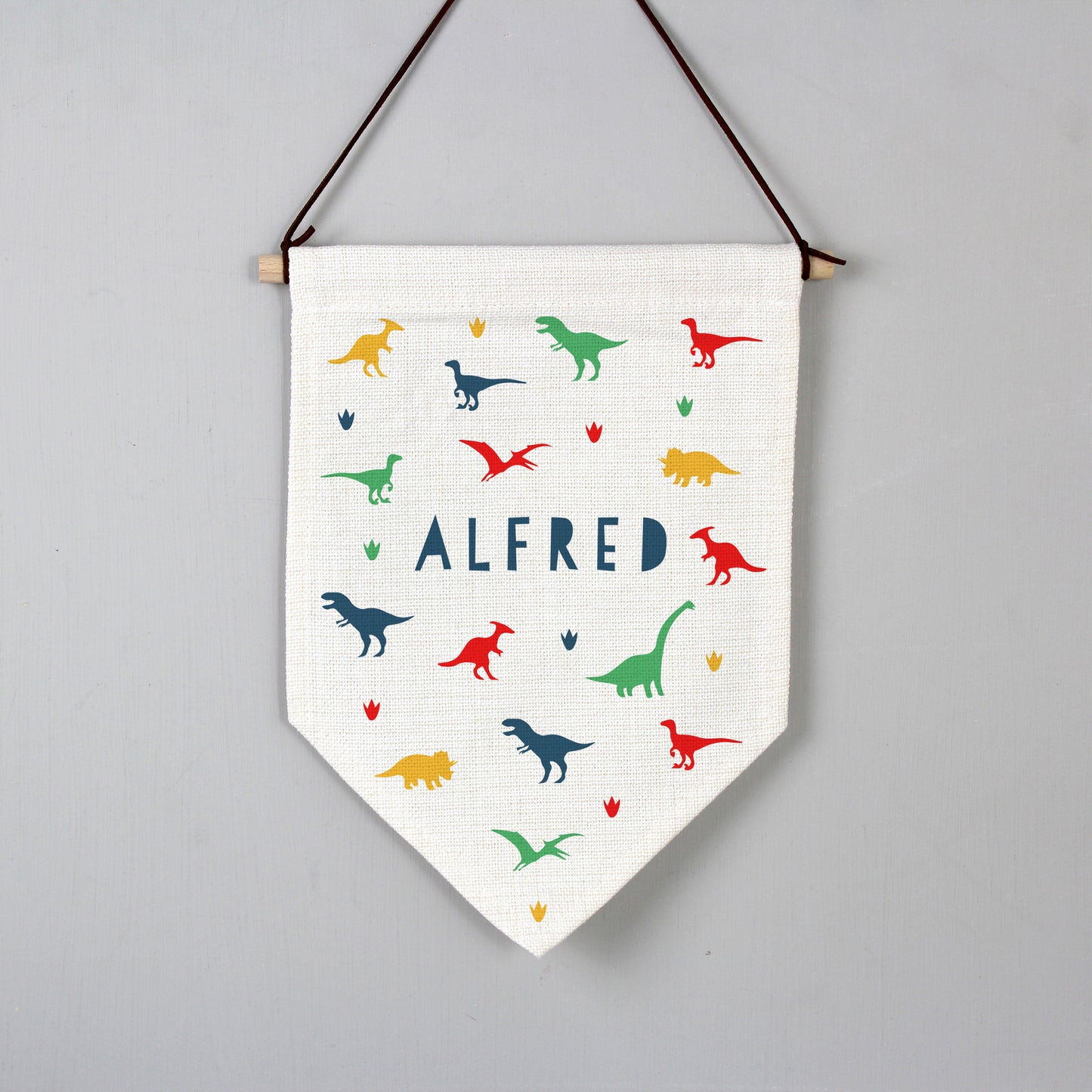 Banner with dinosaur print and personalised with a name