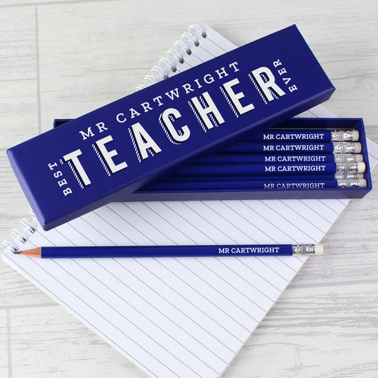 Dark blue box filled with personalised pencils 