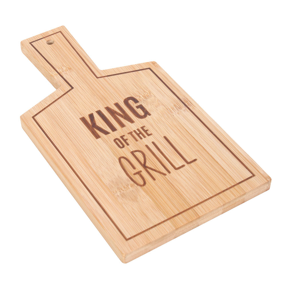 A bamboo serving board featuring the words ‘king of the grill’