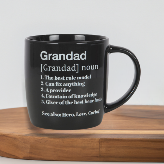 A black mug with a funny definition of the word ‘Grandad’