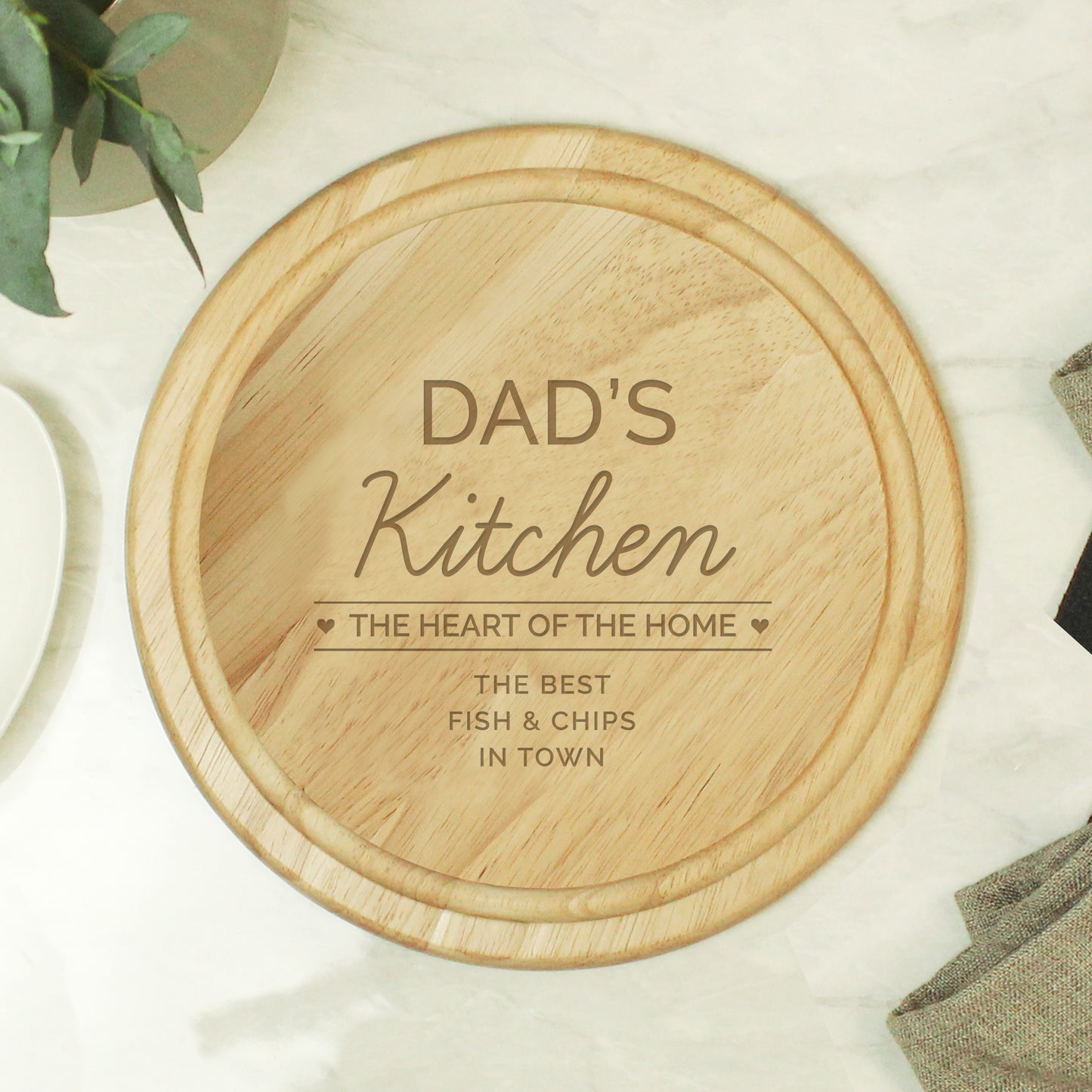 Round chopping board with personalised message 