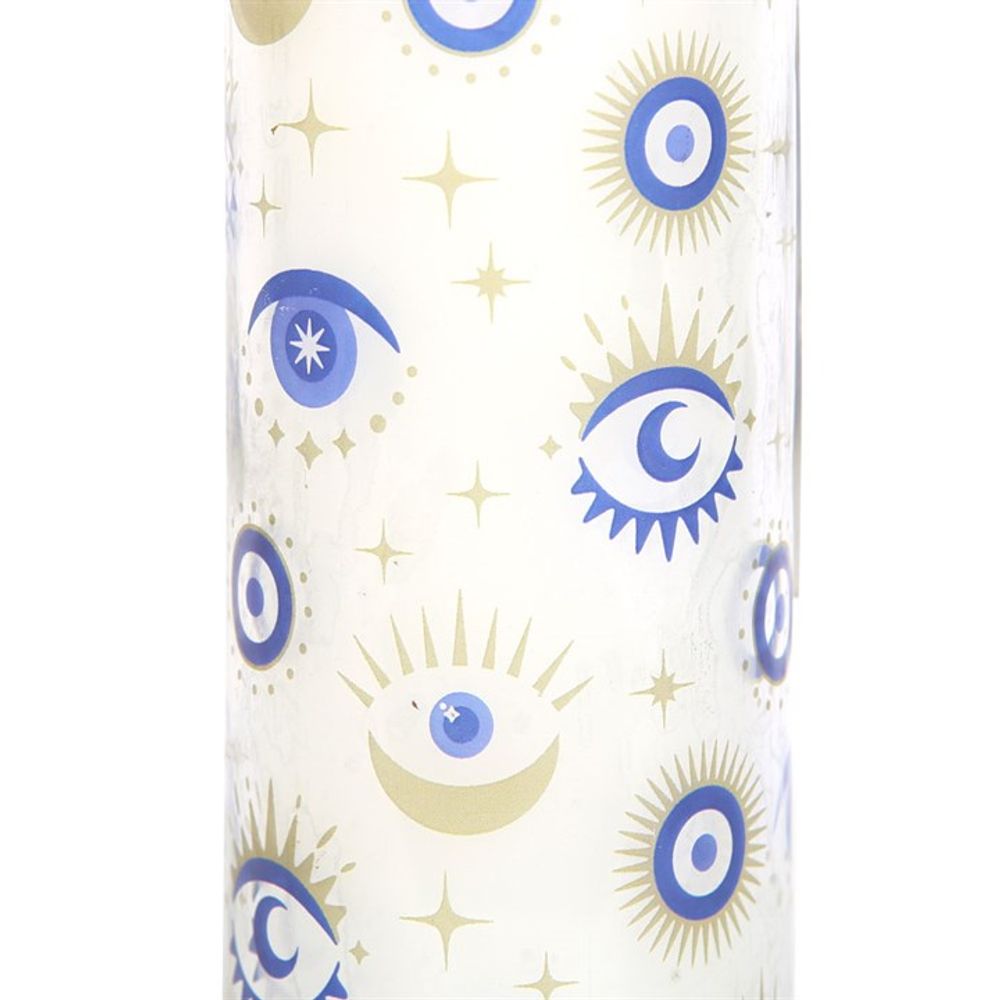 A tall tube candle with all seeing eye design